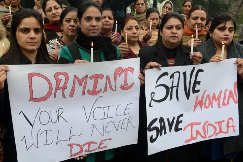 Protesters took part in a candlelight march after rape and murder